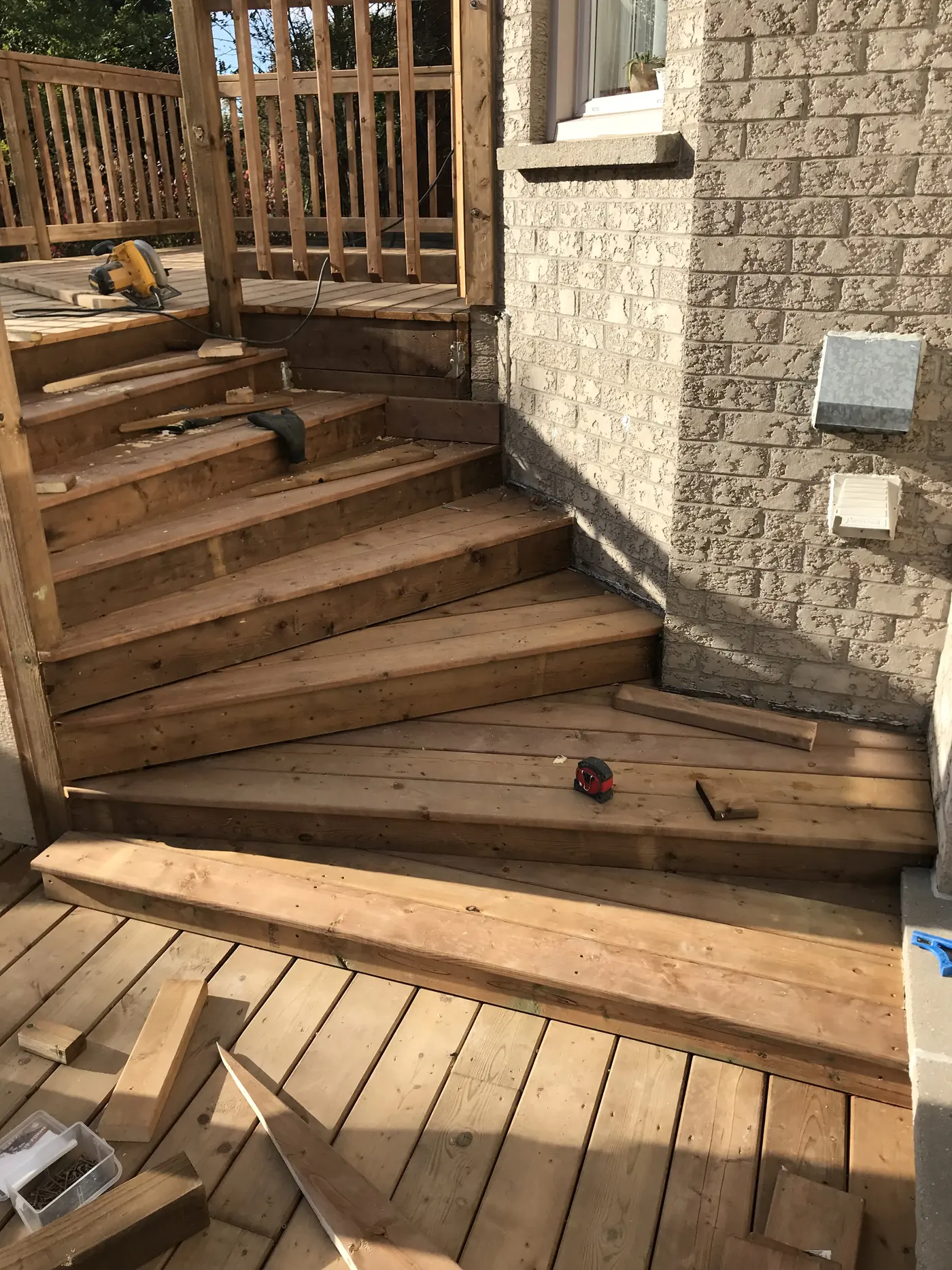 Deck stairs being built between levels in Markham