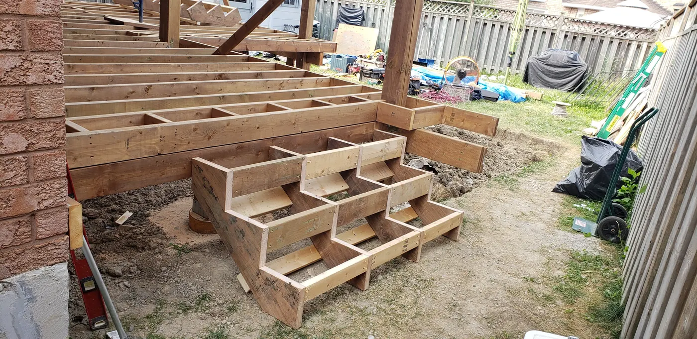 Framed stair stringers and landing for a deck in Vaughan